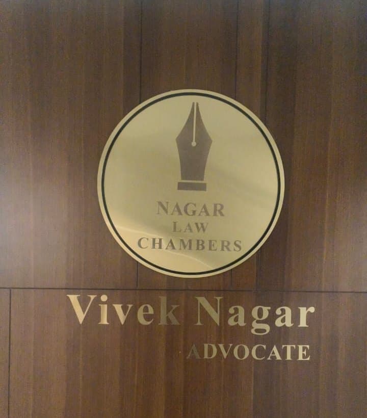 The nameplate of Nagar Law Chambers at Chamber no. 102, B Block, The One Building, South Tukoganj, Indore